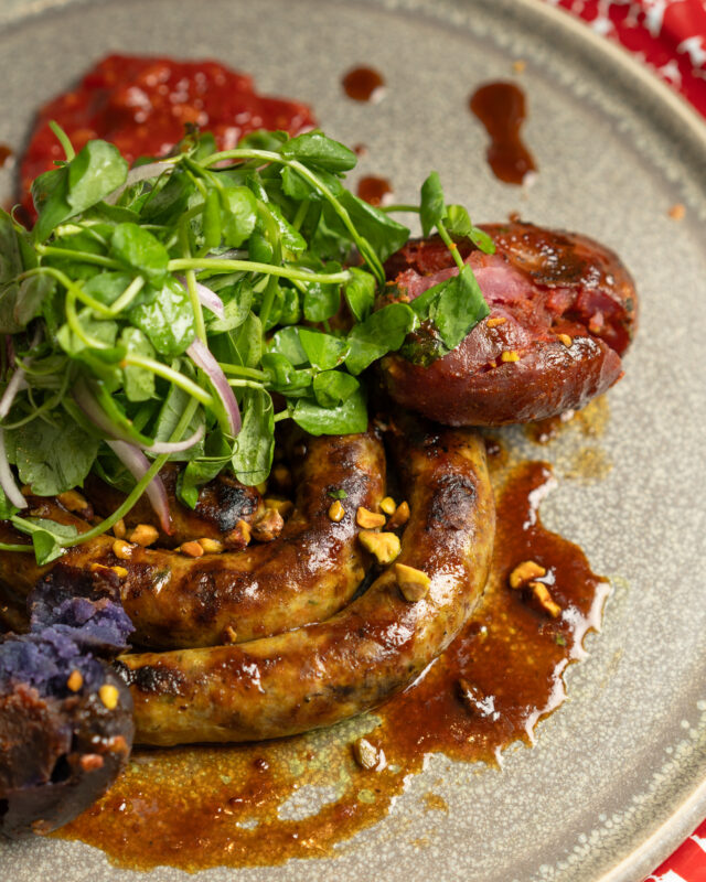 The grill’s been busy lately. 🔥
GRILLED HOUSEMADE LAMB SAUSAGE with Thai basil salad, smashed fingerlings, pistachios, and tamarind BBQ